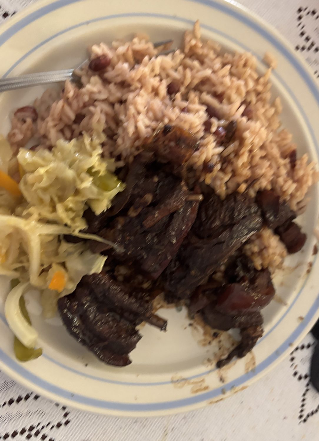 Braised oxtail with rice and peas